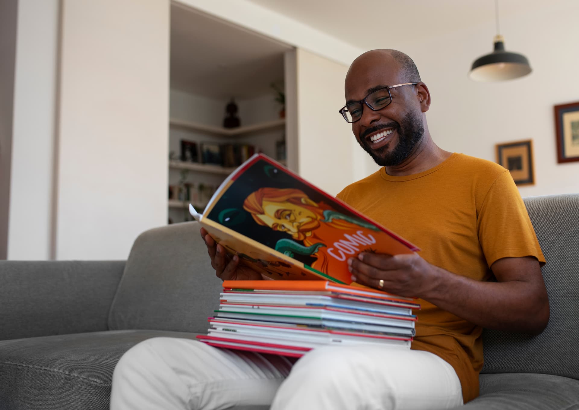 Smiling man with glasses in casual setting